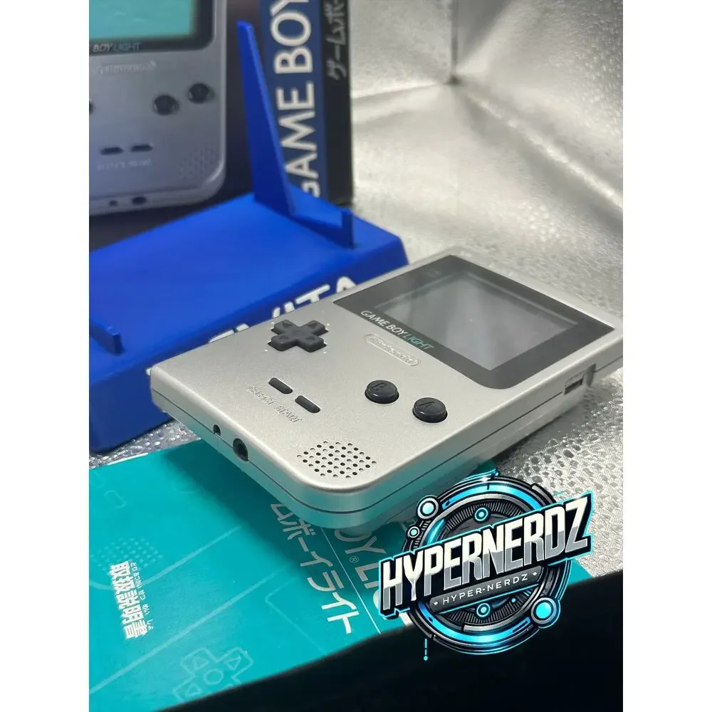 Sliver gameboy light in box! Amazing condition!